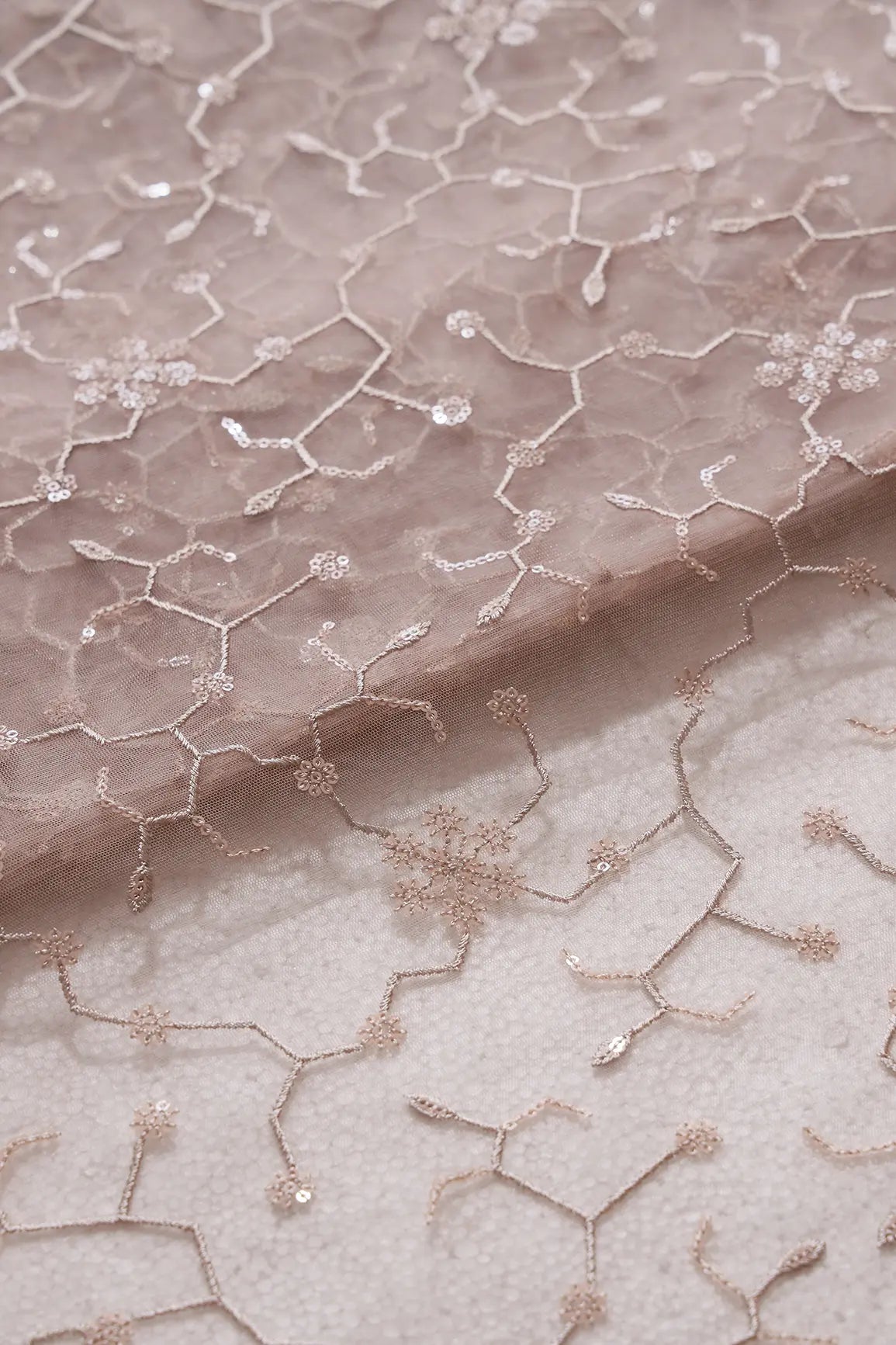 Beautiful Beige Sequins Small Floral Embroidery On Beige Soft Net Fabric