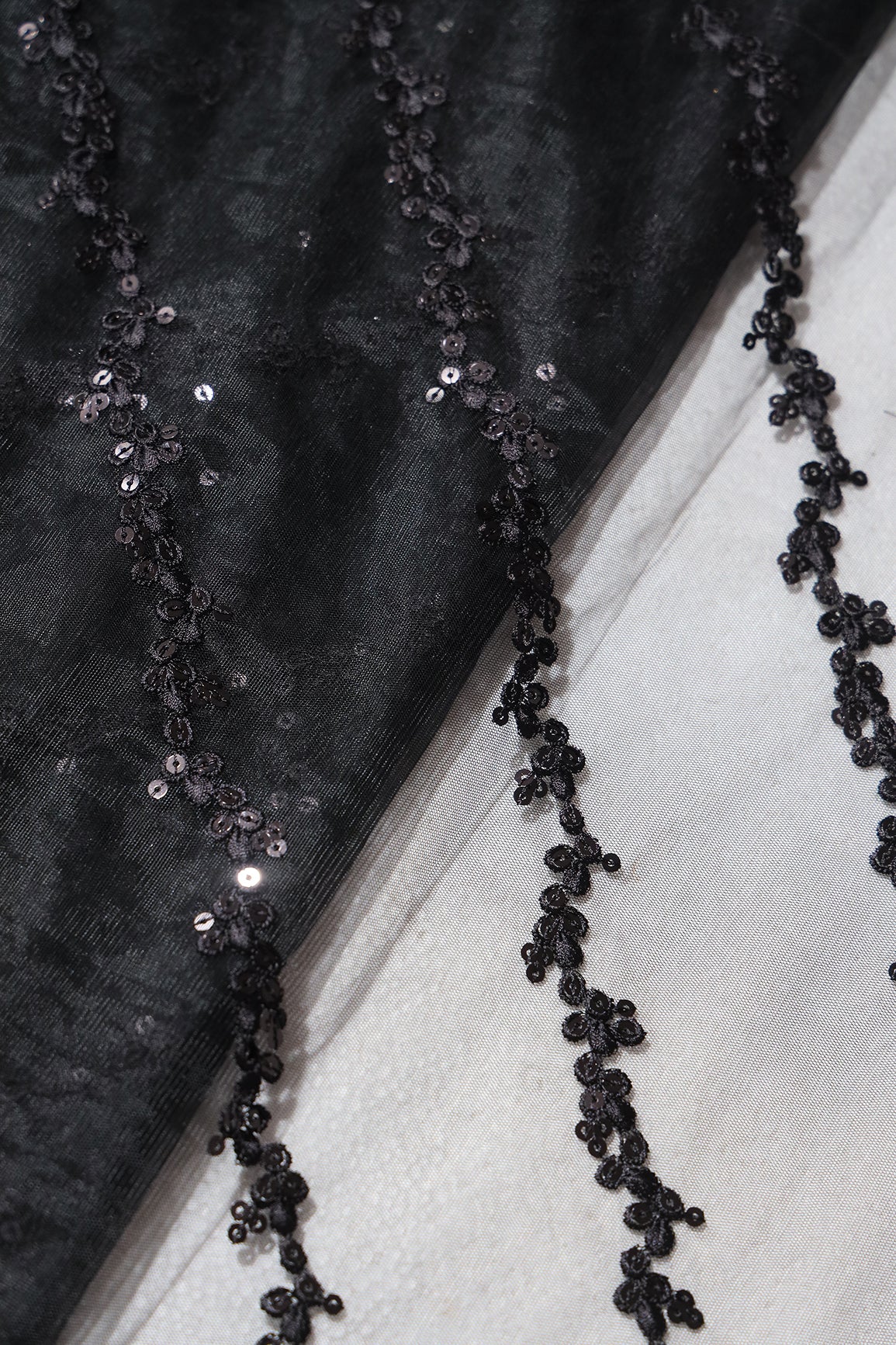 Black Thread With Sequins Strip Embroidery Work On Black Soft Net Fabric
