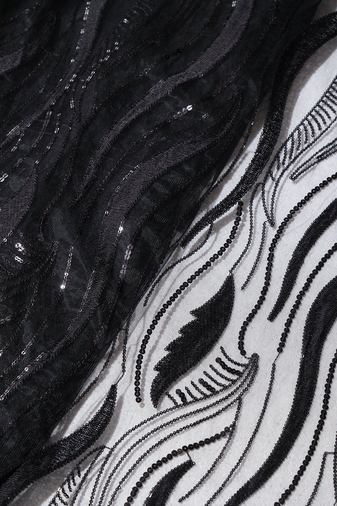 Black Thread With Sequins Wavy Embroidery Work On Black Soft Net Fabric