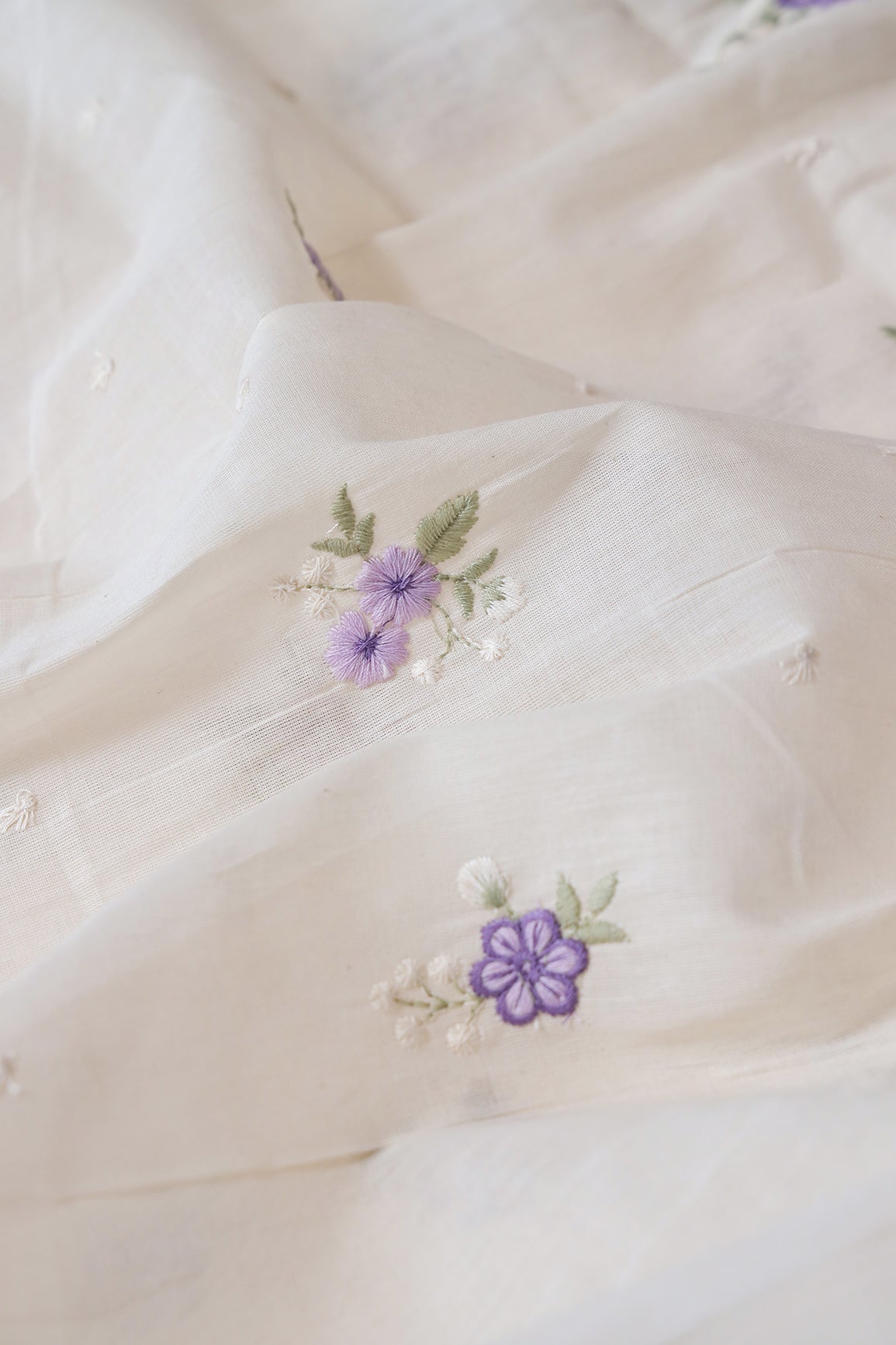 Lavender And Light Olive Thread Small Floral Embroidery On Off White Organic Cotton Fabric