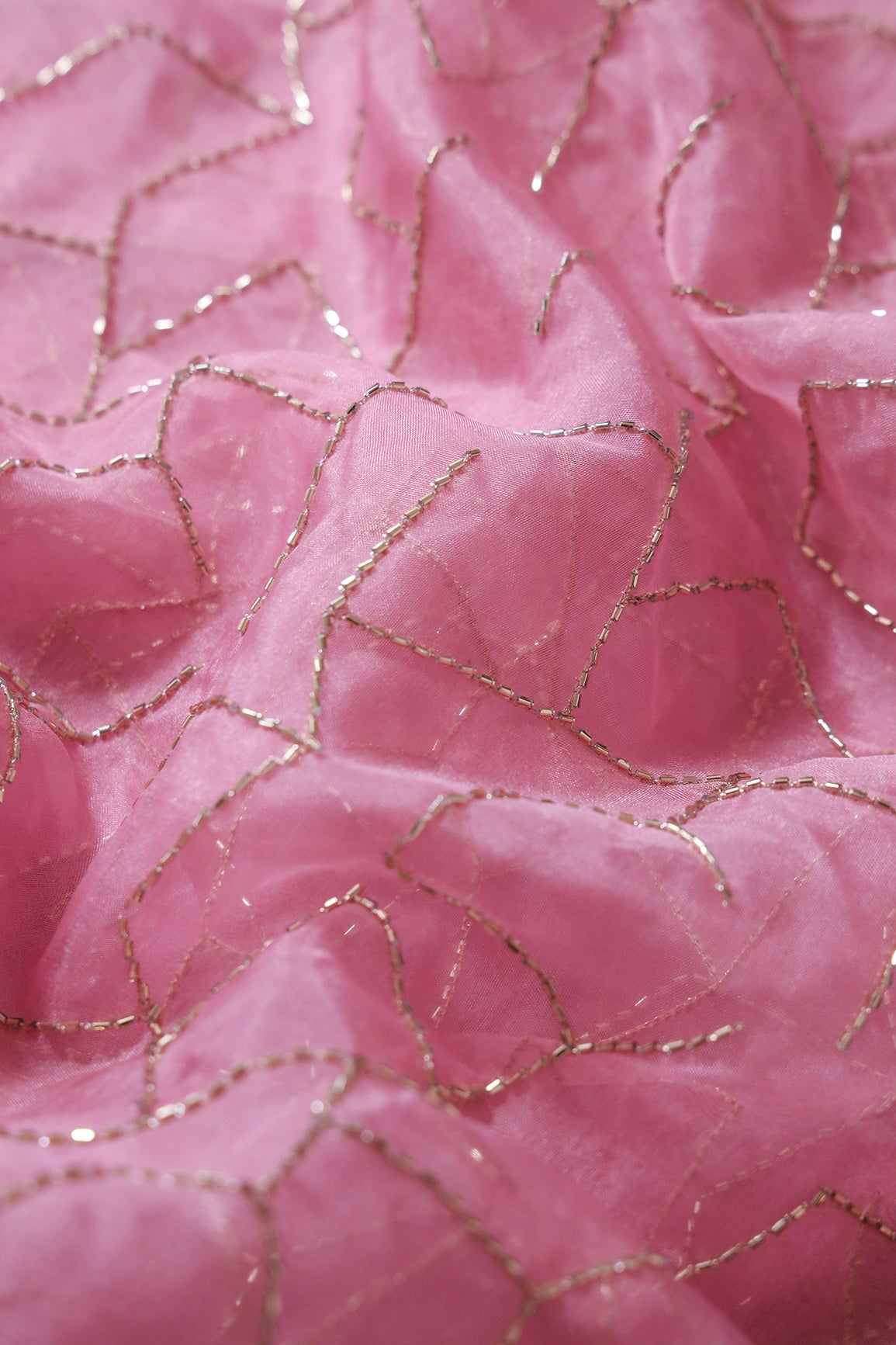 Cut Dana Beads Appealing Abstract Embroidery On Gajri Pink Organza Fabric