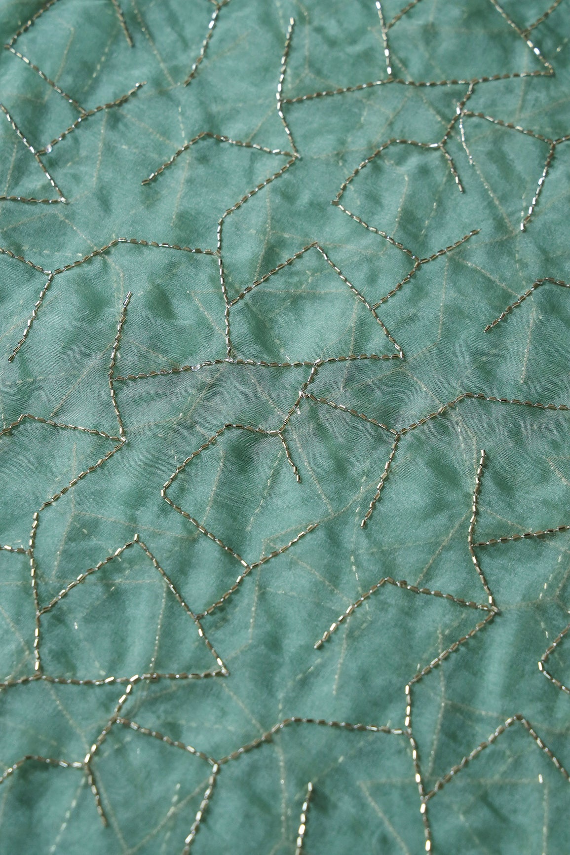 Cut Dana Beads Appealing Abstract Embroidery On Olive Organza Fabric