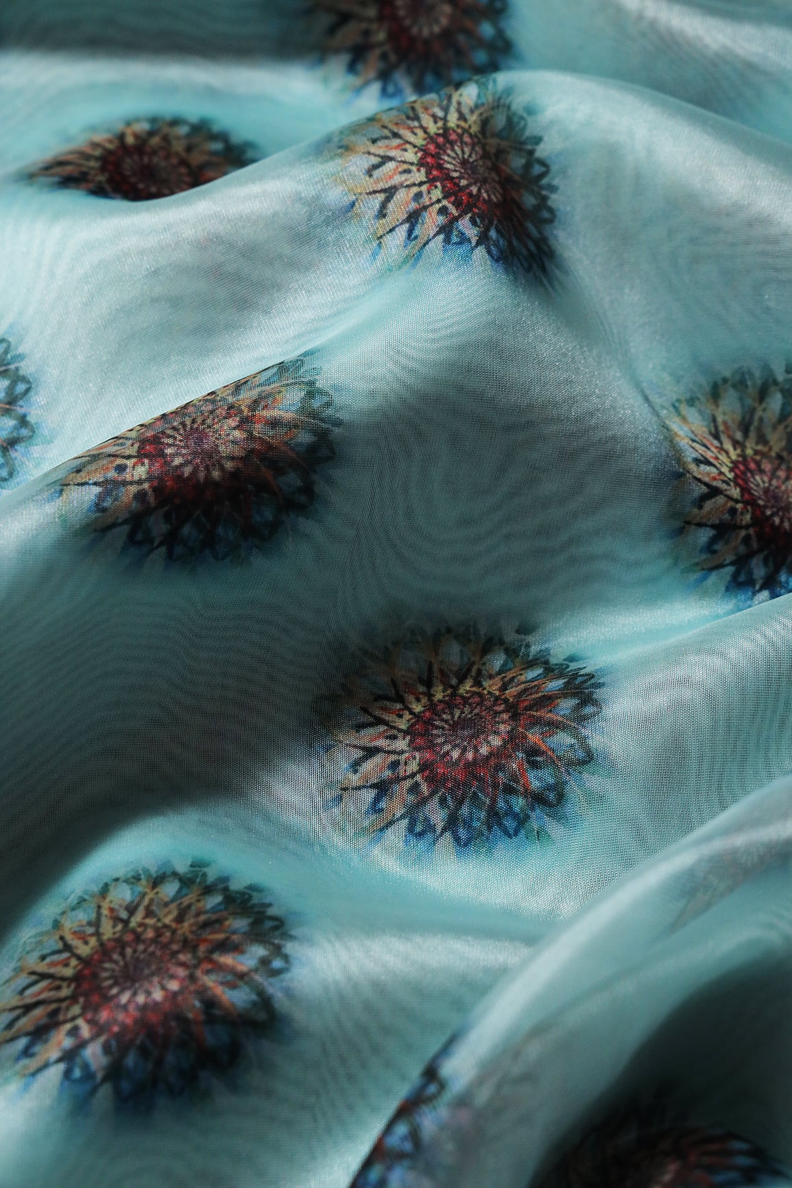 Black And Brown Traditional Pattern Digital Print On Sky Blue Organza Fabric