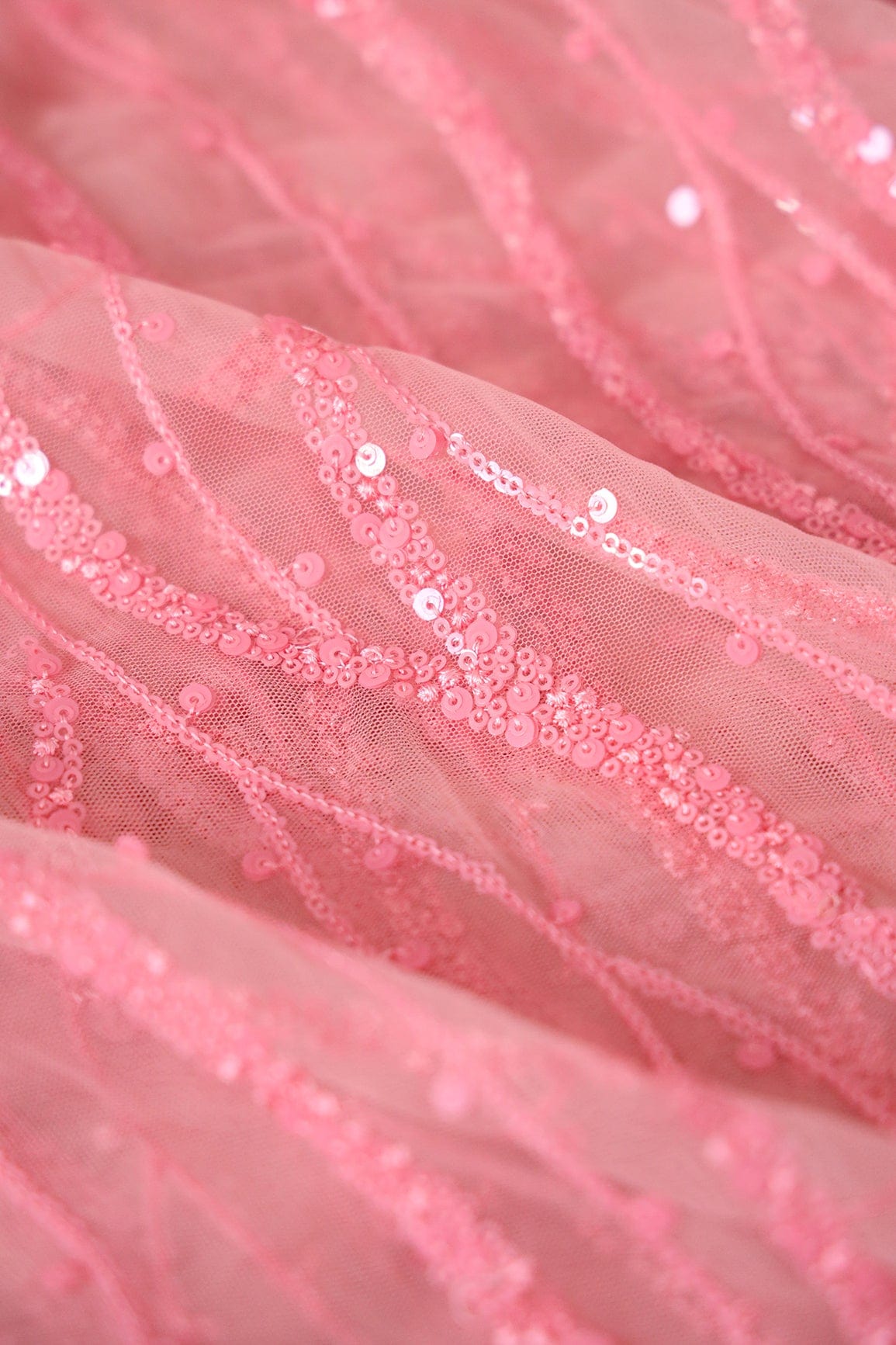 Beautiful Sequins With Pink Thread Wavy Embroidery Work On Pink Soft Net Fabric - doeraa