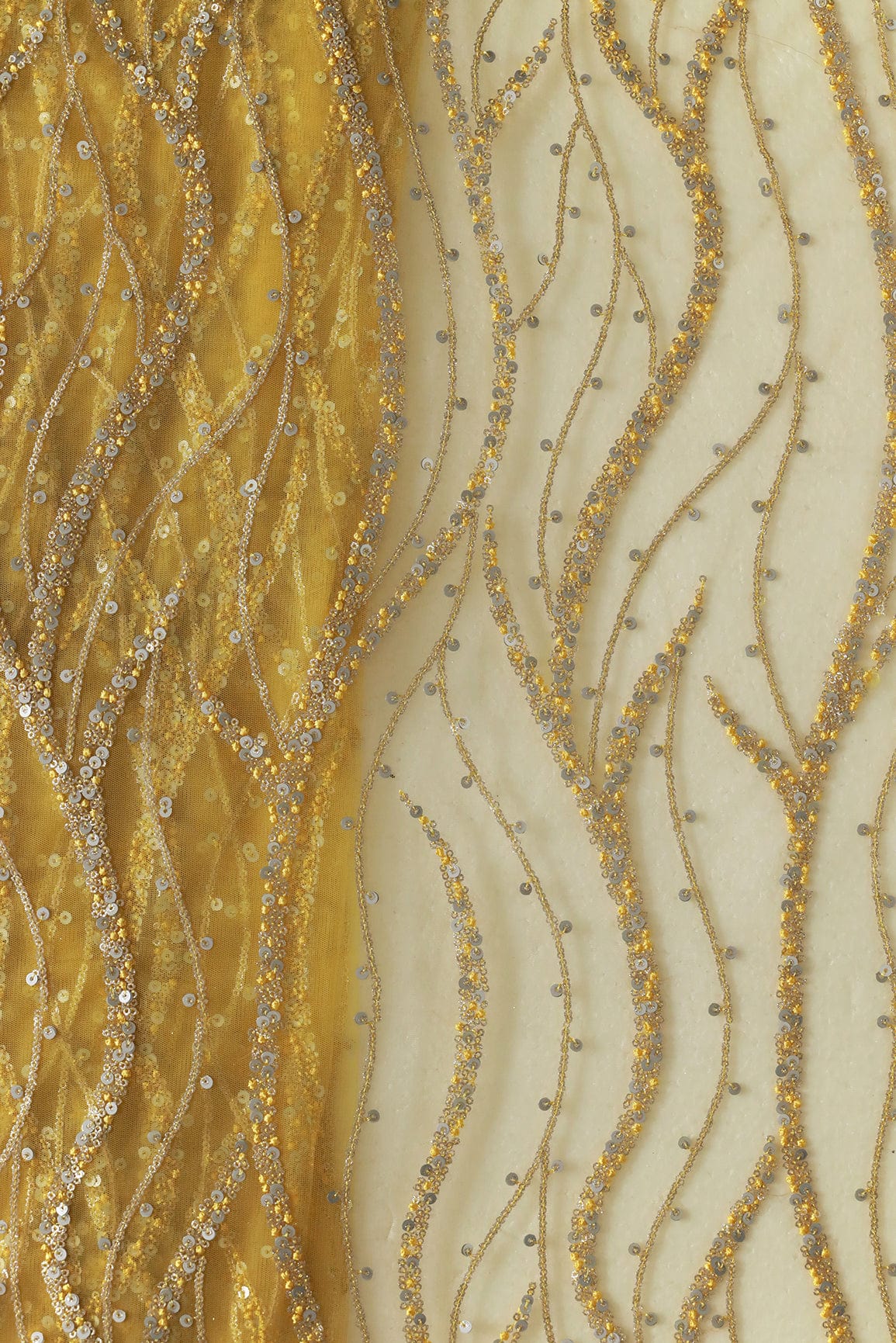 Gold And Silver Sequins With yellow Thread Wavy Embroidery Work On yellow Soft Net Fabric - doeraa