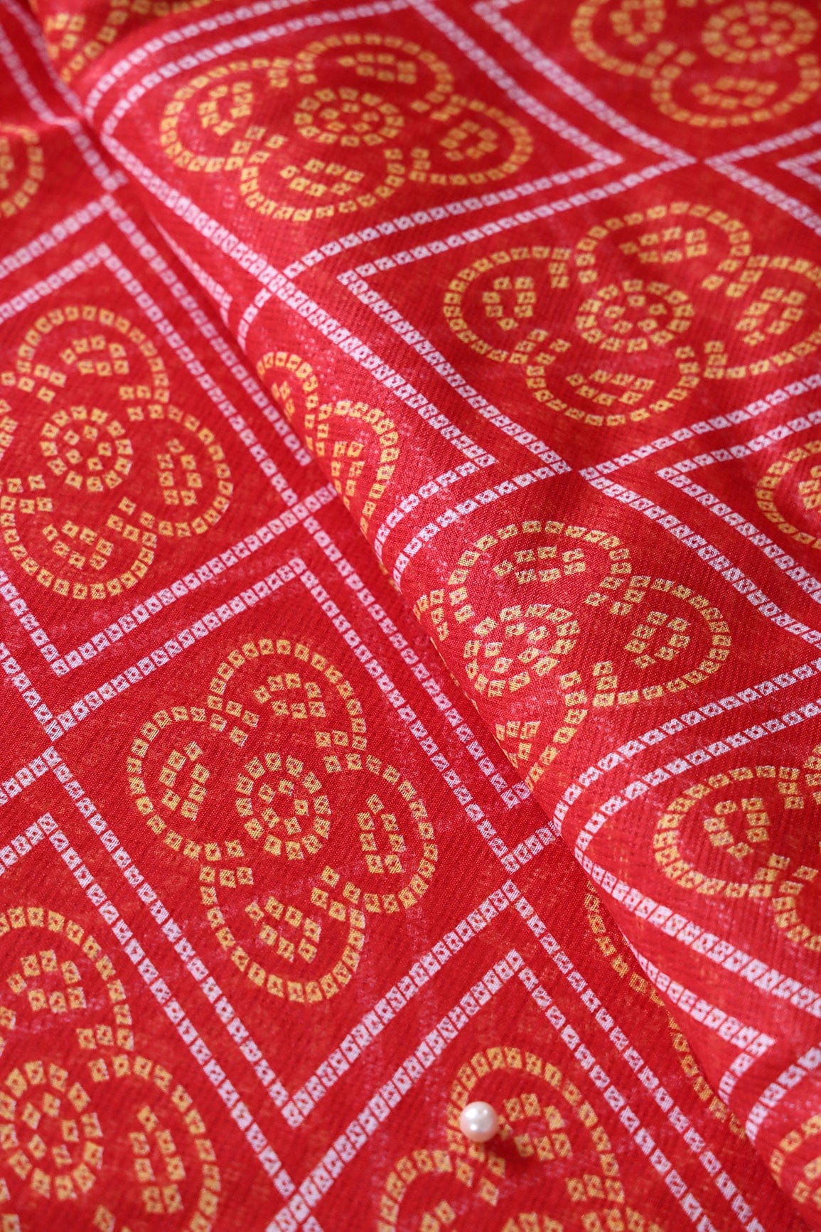 White And Yellow Bandhani Print On Red Kota Doria Fabric - doeraa